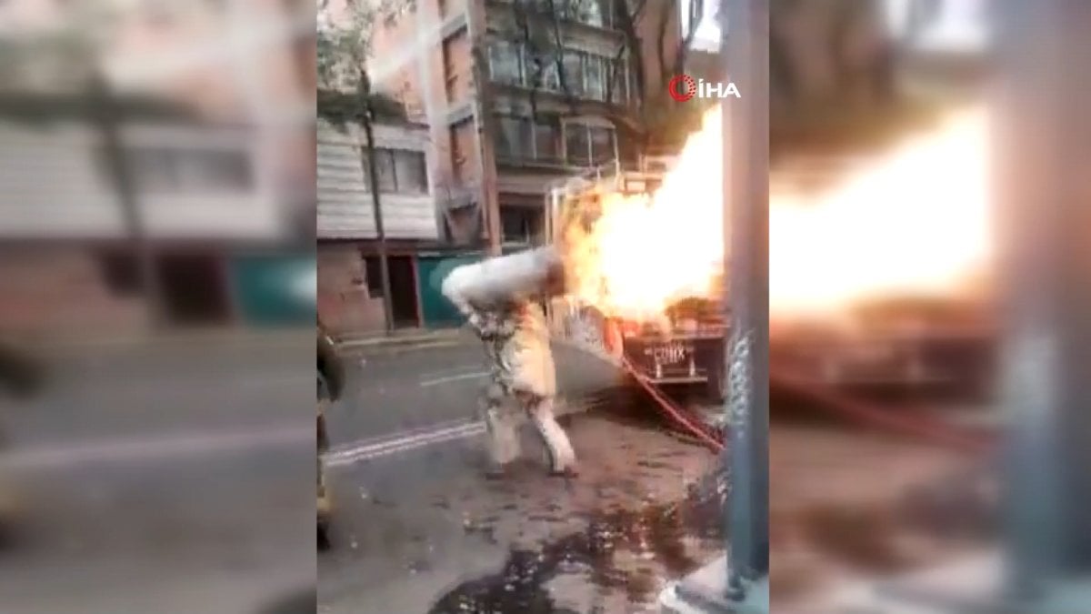 Meksika da bir itfaiyeci, yanan tüp gazı sırtına alarak binadan çıkardı #1